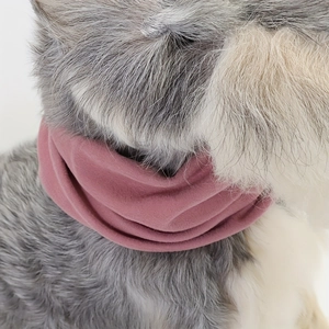 Close-up of soft fleece pet grooming hood for dogs in pink, showing warmth and texture