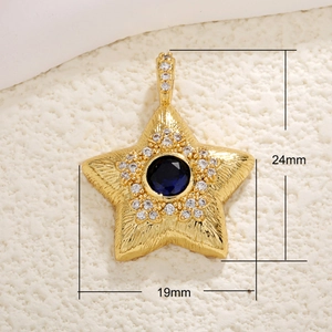 Gold star pendant necklace with deep blue gem and zircon inlay showing 24mm size