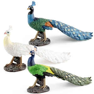 Realistic peacock figurines in blue white and green colors with textured feathers