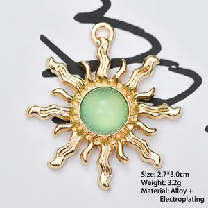 Detailed view of alloy baroque sun flower pendant with green gem for jewelry making