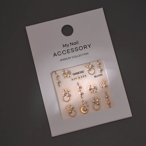 French minimalist nail art kit with gold stars moons and pearls in MJ-035 packaging