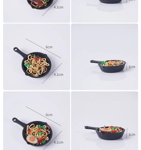 Detailed size view of a 6cm mini simulated frying pan noodle keychain pendant
