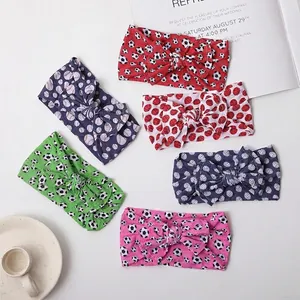 6-pack of soft nylon baby headbands with colorful athletic sports ball prints