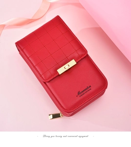 Detailed close-up of red quilted faux leather phone crossbody bag with gold twist lock