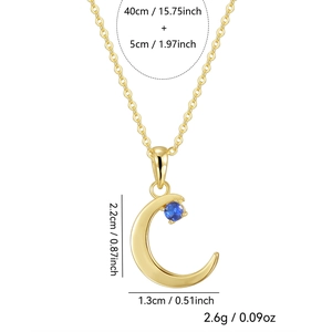 Elegant gold crescent moon necklace with a blue sapphire stone and 40cm adjustable chain