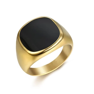 Detailed close-up of a gold-plated signet ring for men featuring a black square stone inlay