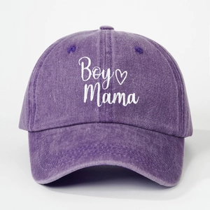Close-up of Boy Mama embroidery and heart detail on washed purple cotton baseball cap