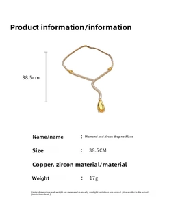 Detailed macro view of 38.5cm gold-plated Y-necklace with yellow drop zircon pendant