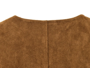 Detailed view of the brown suede jacket neckline with high-quality vertical stitching