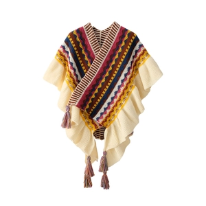 Bohemian knit poncho in beige with colorful stripes and fringe details on white background