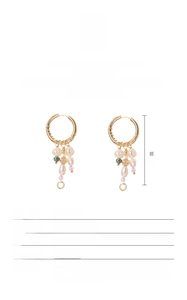 Detailed view of S925 silver baroque pearl earrings with gold beads and 5cm length