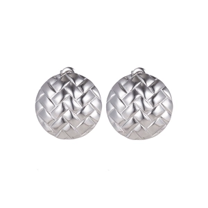 Detailed close-up of silver-tone round stud earrings with intricate braided texture