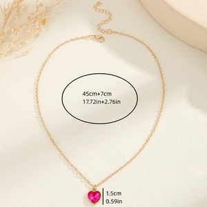 Pink heart pendant necklace in gold setting with dimensions and adjustable chain length
