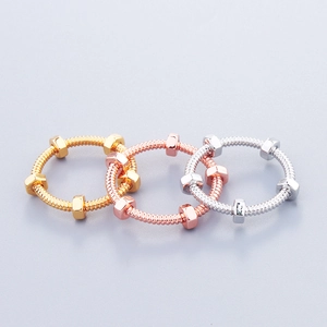 Minimalist nut and bolt style rings in gold, rose gold and silver finishes