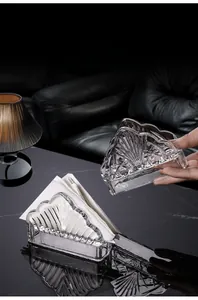 Detailed close-up of 3D embossed crystal glass napkin holder for dining tables