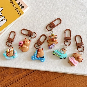 Cute capybara keychain set with various mini cartoon poses for backpacks and gifts