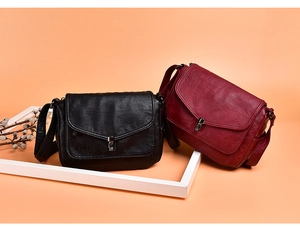 Detailed comparison of vintage soft leather crossbody bags in black and wine red tones