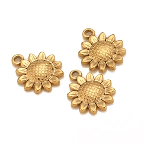 Detailed macro view of three golden sunflower pendants with intricate petal textures