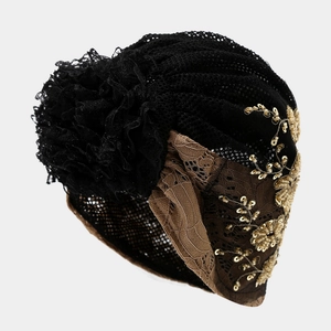 Women's vintage lace turban hat featuring gold sequin plum blossoms and a side flower