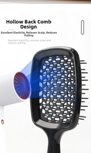Detailed hollow-out design of the hairbrush showing airflow compatibility for blow-drying