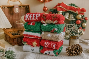 Thick Christmas coral fleece socks set with deer and star patterns in festive colors