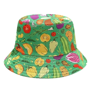 Green reversible bucket hat with vibrant vegetable prints for outdoor sun protection