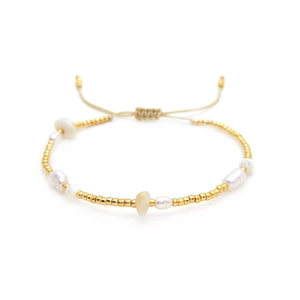 Bohemian style freshwater pearl bracelet with golden TOHO beads and adjustable closure