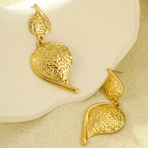 Fashionable golden textured leaf drop earrings with irregular hammered metal finish
