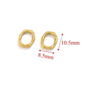 Detail view of 10.5mm by 8.5mm golden irregular circle charms with wave texture