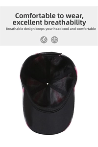 Close-up of breathable black mesh lining and pink plaid pattern on a baseball cap