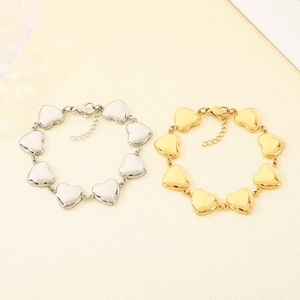 Bracelets à perles en forme de cœur évidé en or 18 carats et argent avec fermoir mousqueton