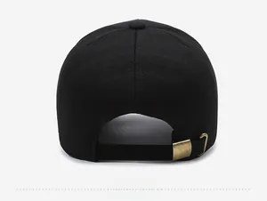 Detail view of the back of a black baseball cap featuring an adjustable bronze metal buckle