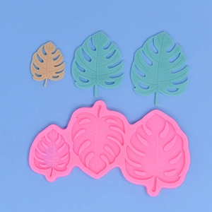 Pink monstera leaf silicone mold for DIY cake decorating and resin craft projects