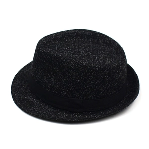 Detail of black fedora hat with silver glitter texture and stylish ribbon band