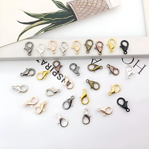 Detailed view of 12mm lobster clasps in gold, silver, and bronze for DIY jewelry making