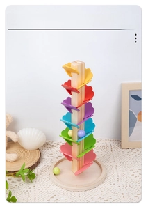 Detailed view of colorful wooden rainbow music tree petals with small rolling balls