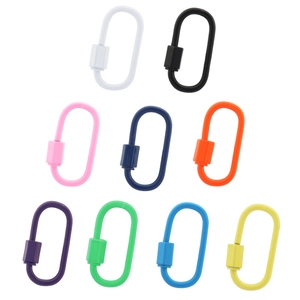 Macro shot of colorful screw lock carabiner hooks in nine bright finishes for jewelry