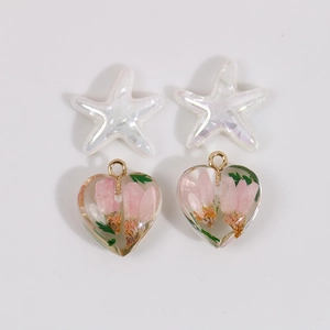 Pink dried flower heart pendants and white star beads for DIY jewelry making