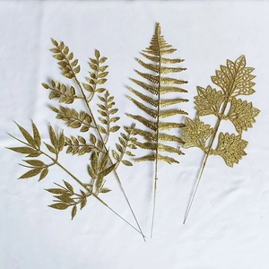 Glittery gold artificial decorative leaves for Christmas and wedding festive arrangements