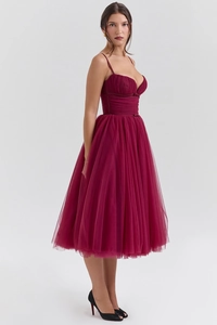 Detailed side view of wine red mesh dress with elegant layered tulle and backless straps