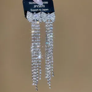 Elegant 925 silver bow tassel earrings with sparkling cubic zirconia stones for women
