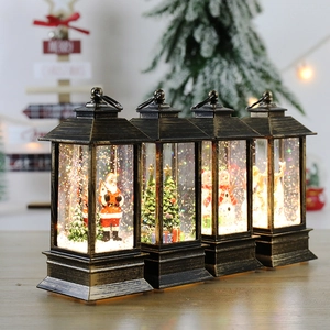 Set of four bronze retro Christmas lanterns with glowing LED light and festive figurines