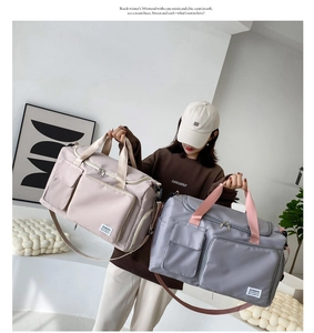 Pink and grey multi-functional fitness travel bags with separate compartments and straps