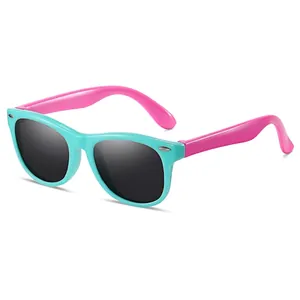 Kids polarized sunglasses with blue frames and pink temples in a classic wayfarer style
