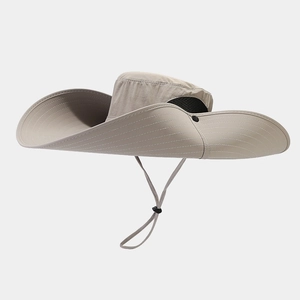 Detail view of breathable side mesh and adjustable chin strap on this outdoor sun hat
