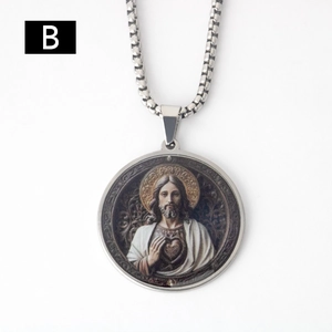 Macro detail of round stainless steel religious Jesus portrait pendant necklace