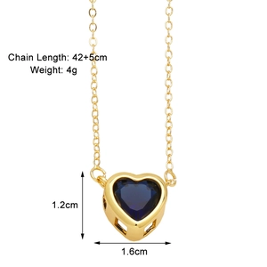 Detail showing gold heart necklace dimensions 42+5cm length and blue crystal pendant size