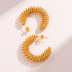 Minimalist gold twisted wire hoop earrings with a spiral C-shaped geometric design