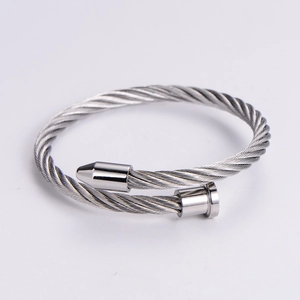 Polished silver stainless steel cable wire bracelet with cone tip and industrial style