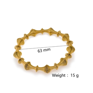 Elegant gold stainless steel spring wire bracelet with tapered spiral design 63mm